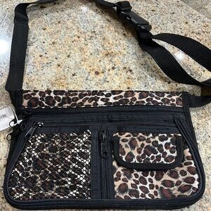 Unknown brand leopard printed Fanny pack.  Excellent condition.